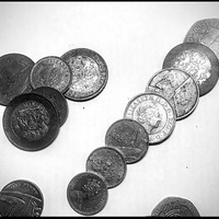 A NECESSARY EVIL ( MONEY )