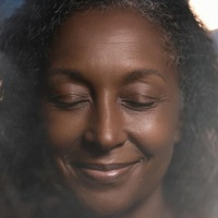 Behind the mother's smile